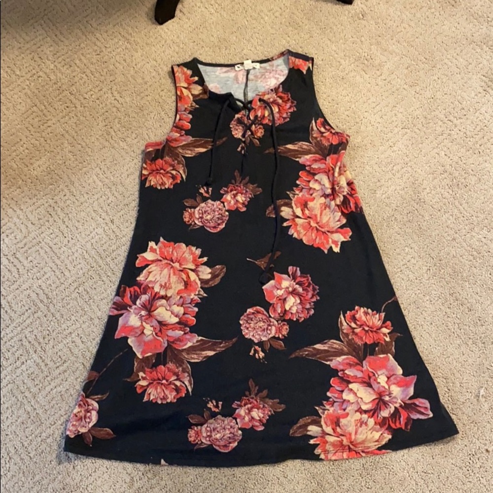 I’m selling a black floral dress.